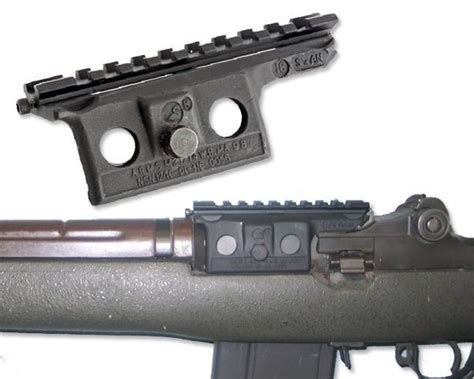 The original M14 mounting system consists of two mounting slots and one threaded hole on the left side of the receiver. . Sadlak m1a scope mount vs springfield